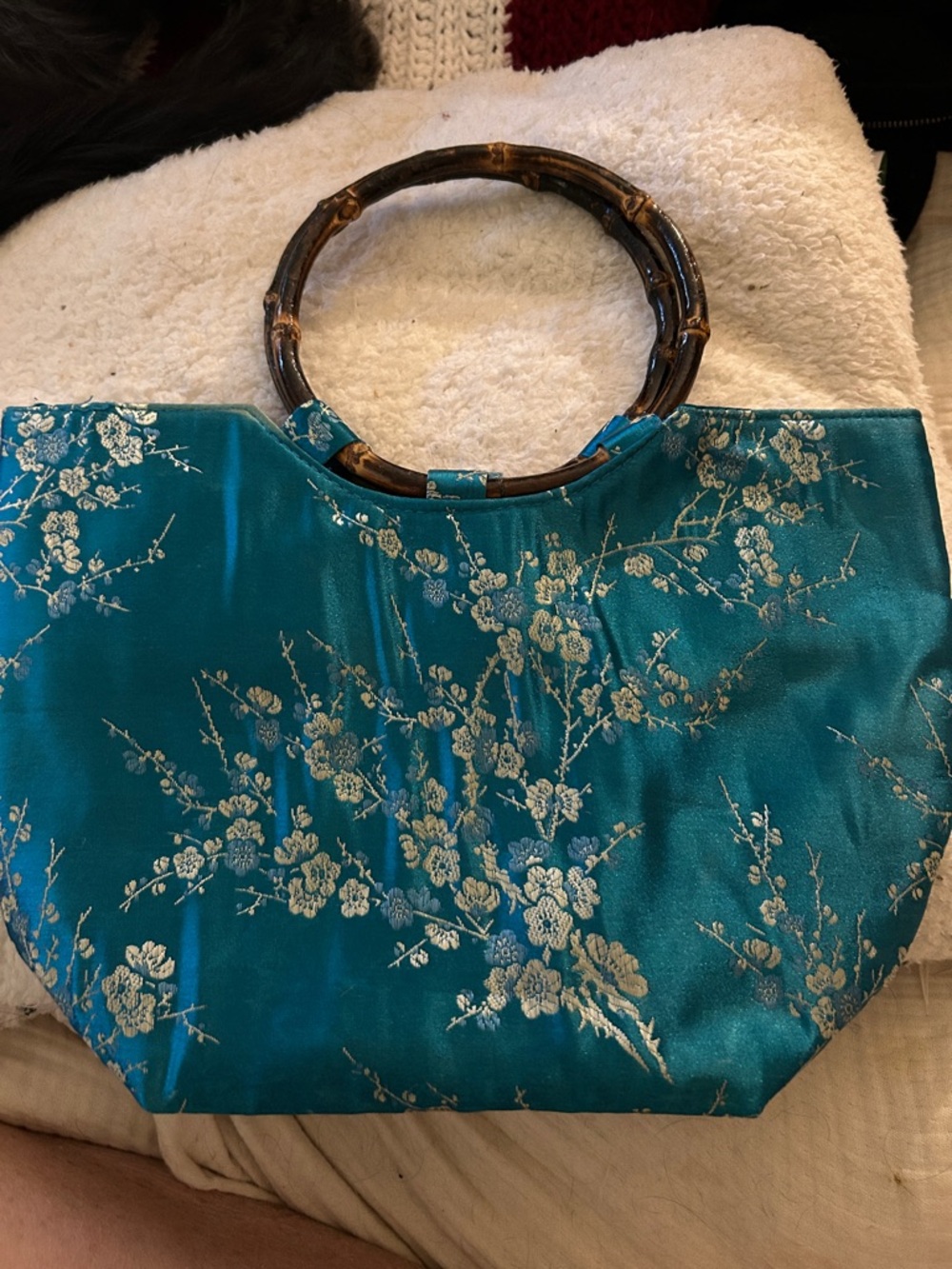 Teal satin handbag